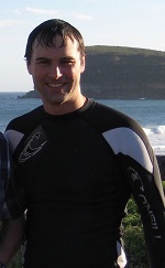 Photo of Dr Gartland in a wet suit